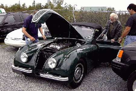 1954 Jaguar XK120 about to miss the trip