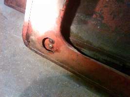 Coupe window frame lower bolt