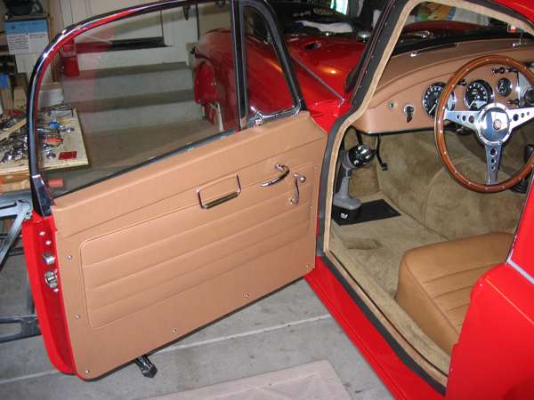 MGA Coupe door interior, weather seal, and deal hold-down strip