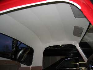 Coupe headliner with trim and visors