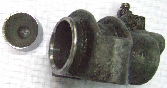 Clutch slave cylinder with worn bore and badly worn aluminum piston