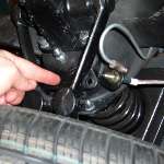 MGB inverted shock arm and mismatched brake line fitting
