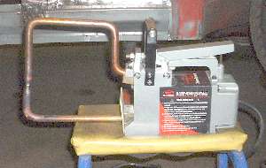 Spot welder with extended tongs