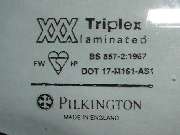 Triplex/Pilkington label on glass