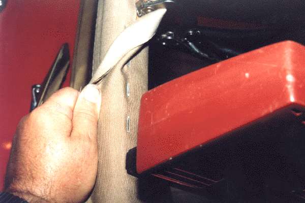 Stapling wrap completely around header rail